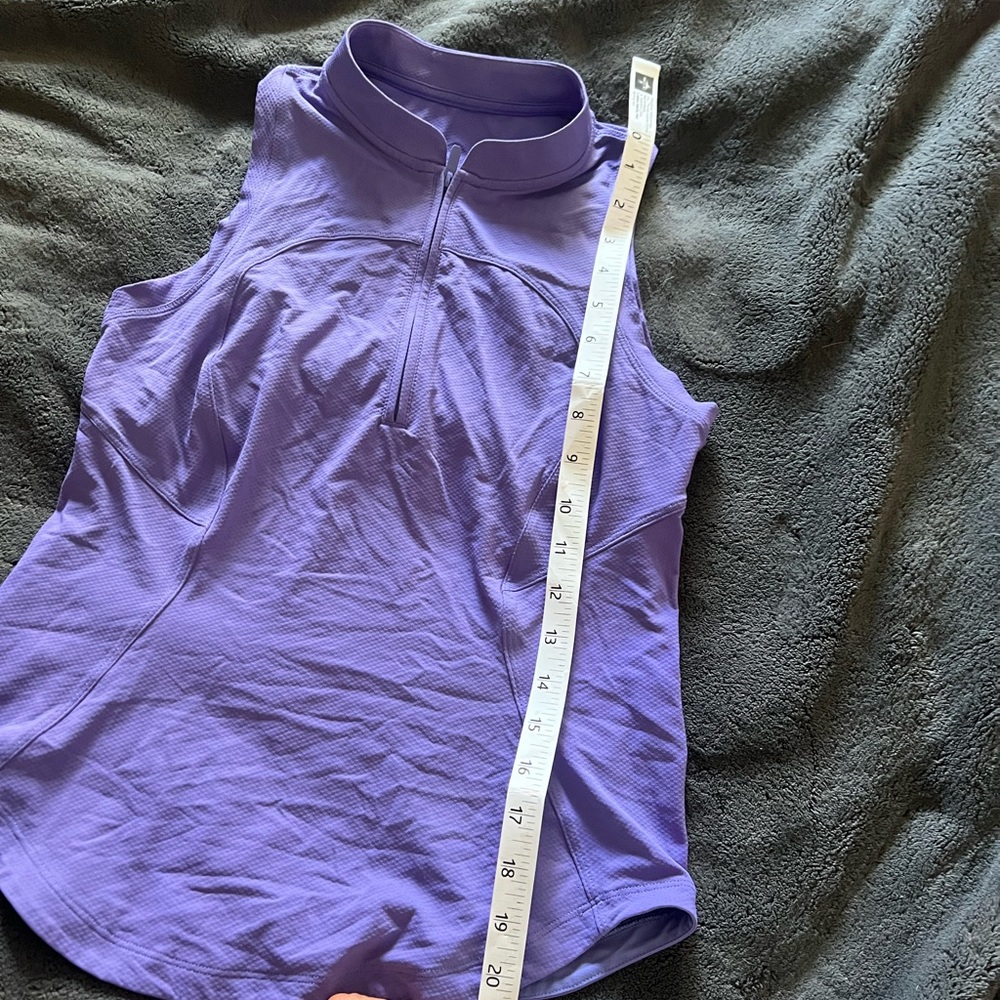 Lululemon tennis workout top. Very flattering size 4. Was to tight for me